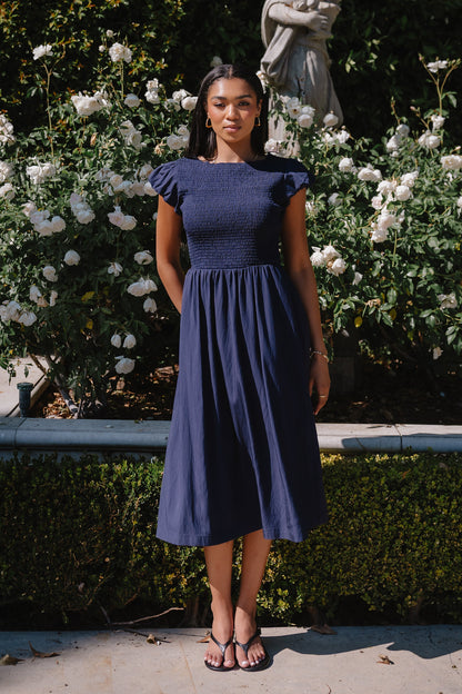 Harshell Smocked Midi Dress