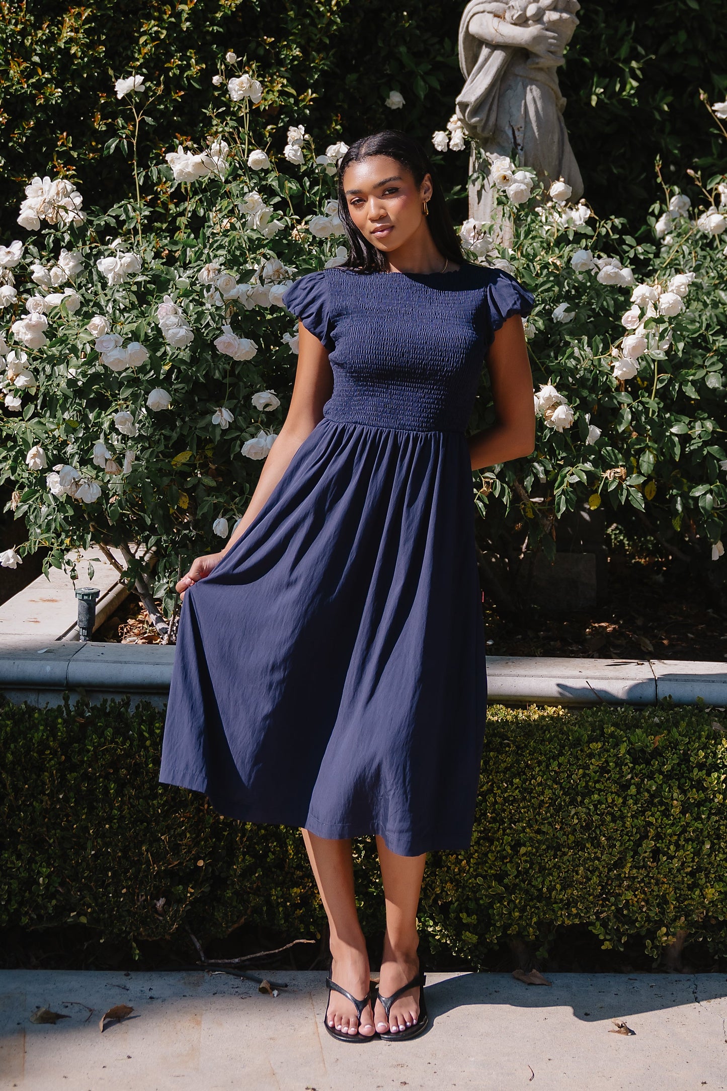 Harshell Smocked Midi Dress